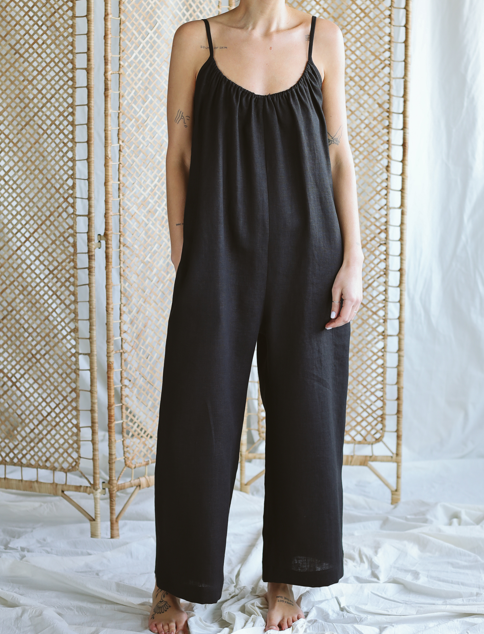 Loose black linen wide leg strap jumpsuit